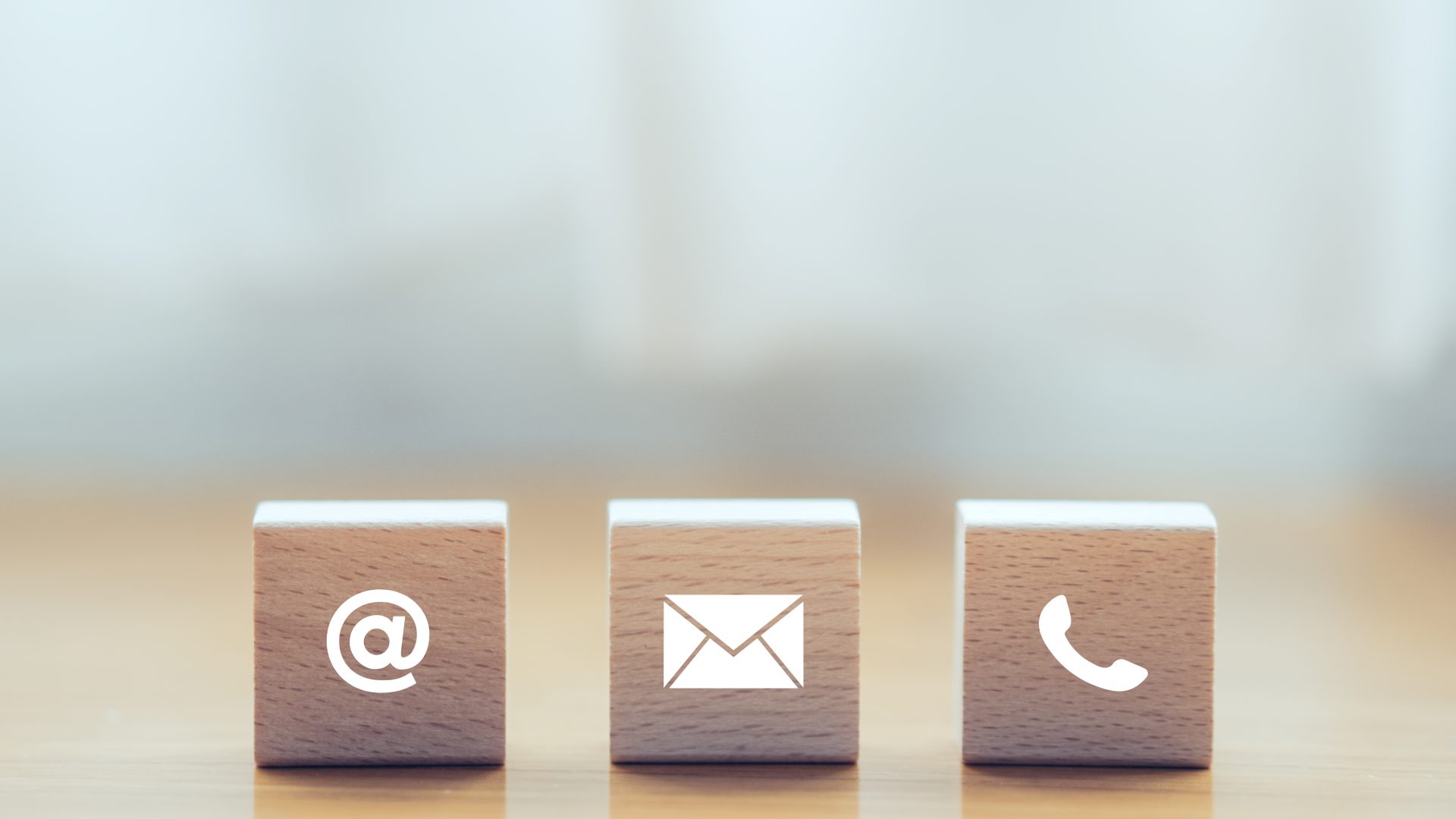 Contact,us,icon,(phone,,email,,mail,),on,wood,cube,
